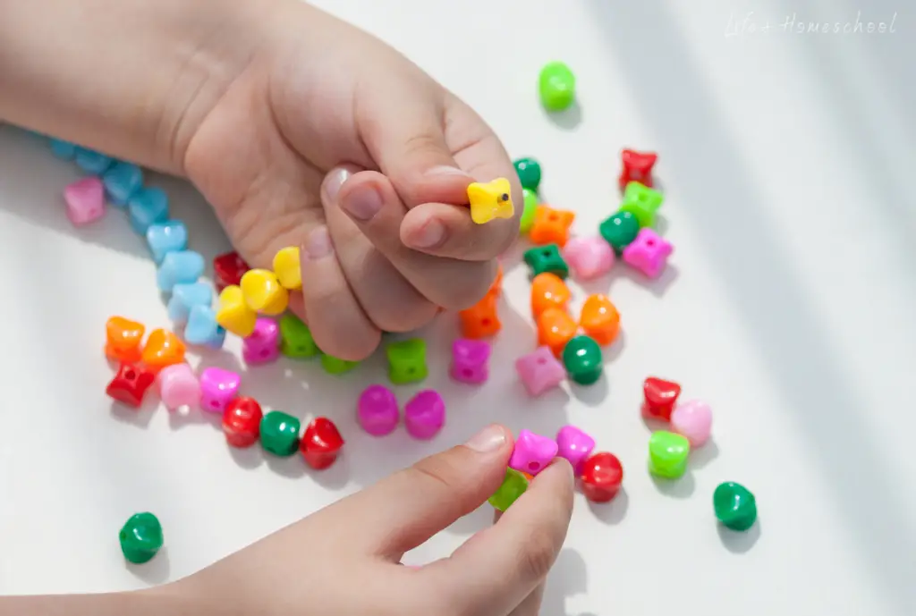 Lacing Beads and Cards to Build Motor Skills