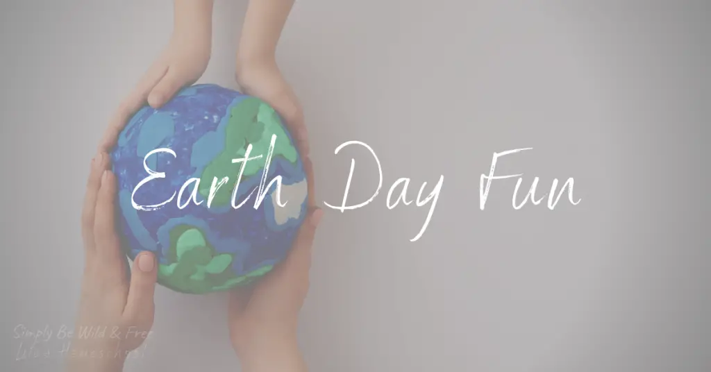 Hands holding a clay Earth with white texts that reads Earth Day Fun
